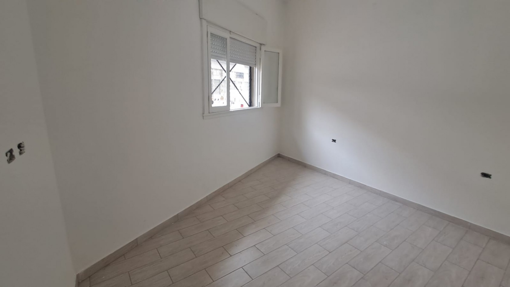 DEPARTAMENTO 2 AMB CON PATIO Y LOCAL CON DEPOSITO.REF.916
